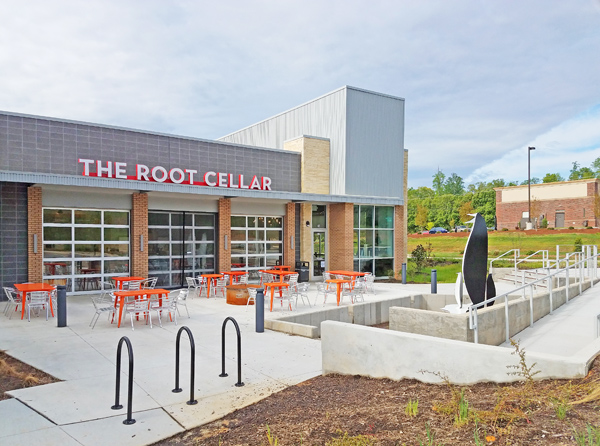 Outdoor tables at The Root Cellar. Dog friendly patio in Pittsboro at Penguin Place. 
