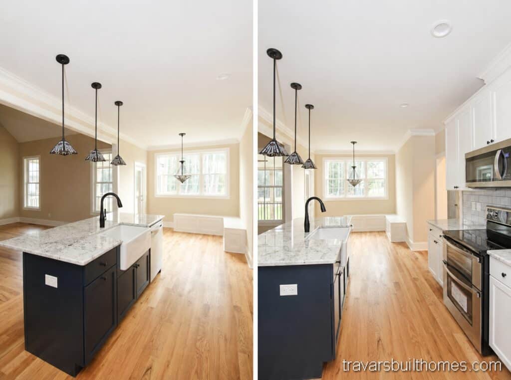 Modern kitchen island design featuring a dark navy blue base, a light granite countertop with an apron-front farmhouse sink, a black gooseneck faucet, and three industrial-style pendant light fixtures.