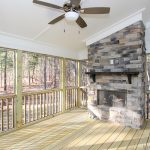 Stone Fireplace in Screen Porch | Chapel Hill New Home Builder