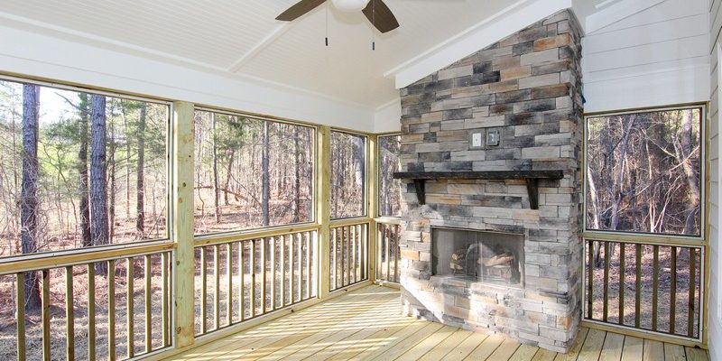 Stone Fireplace in Screen Porch | Chapel Hill New Home Builder