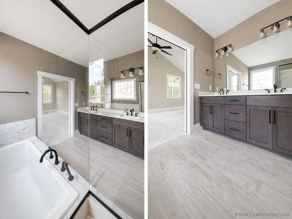 Split perspective of a primary bathroom detailing a glass-enclosed tub and shower combination with marble-style tile on the left, and a long dark double vanity on the right, by Travars Built Homes.