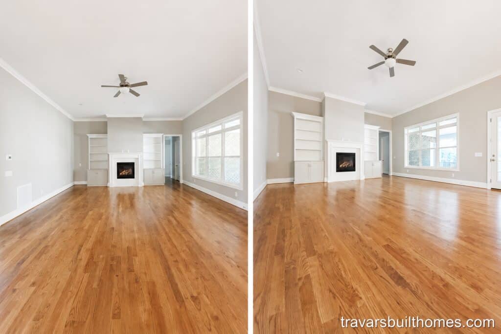 Bright living room with hardwood floors, fireplace, ceiling fan, and large windows.