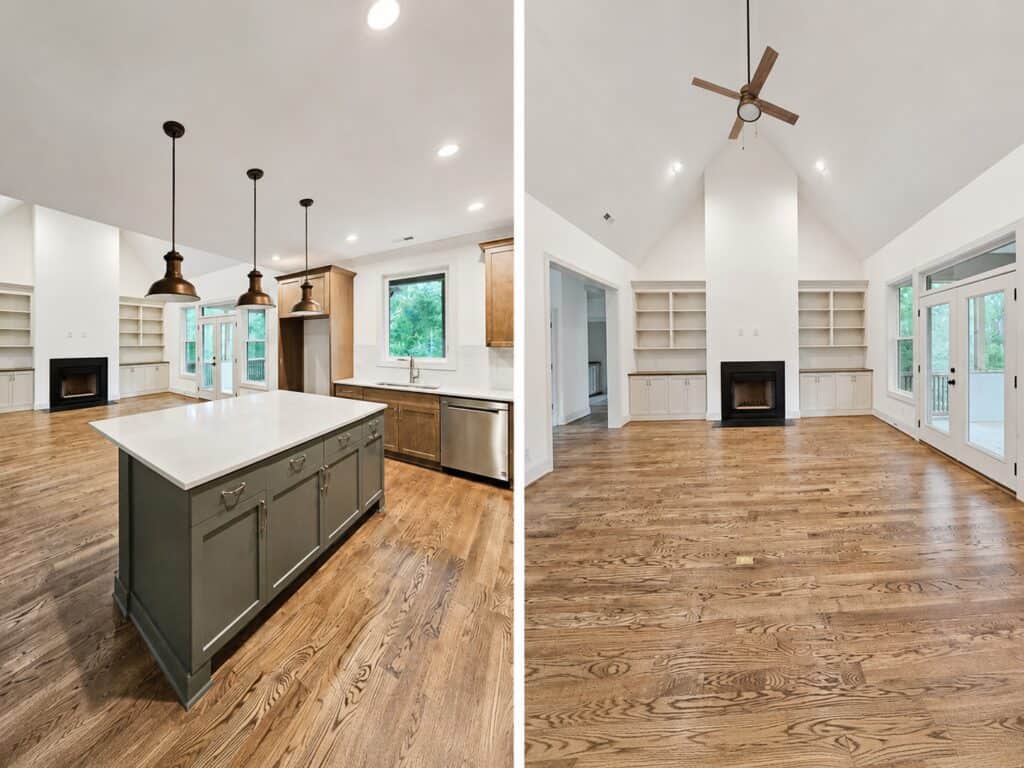 Split perspective highlighting a modern dark gray kitchen island on the left and a dramatic vaulted living room with a white chimney breast and black fireplace on the right, by Travars Built Homes.