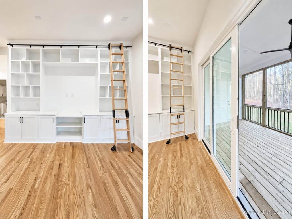 Bright custom living room showcasing warm hardwood floors, an expansive white built-in entertainment center with a rolling wooden library ladder, and large sliding glass doors opening to a screened porch, by Travars Built Homes.