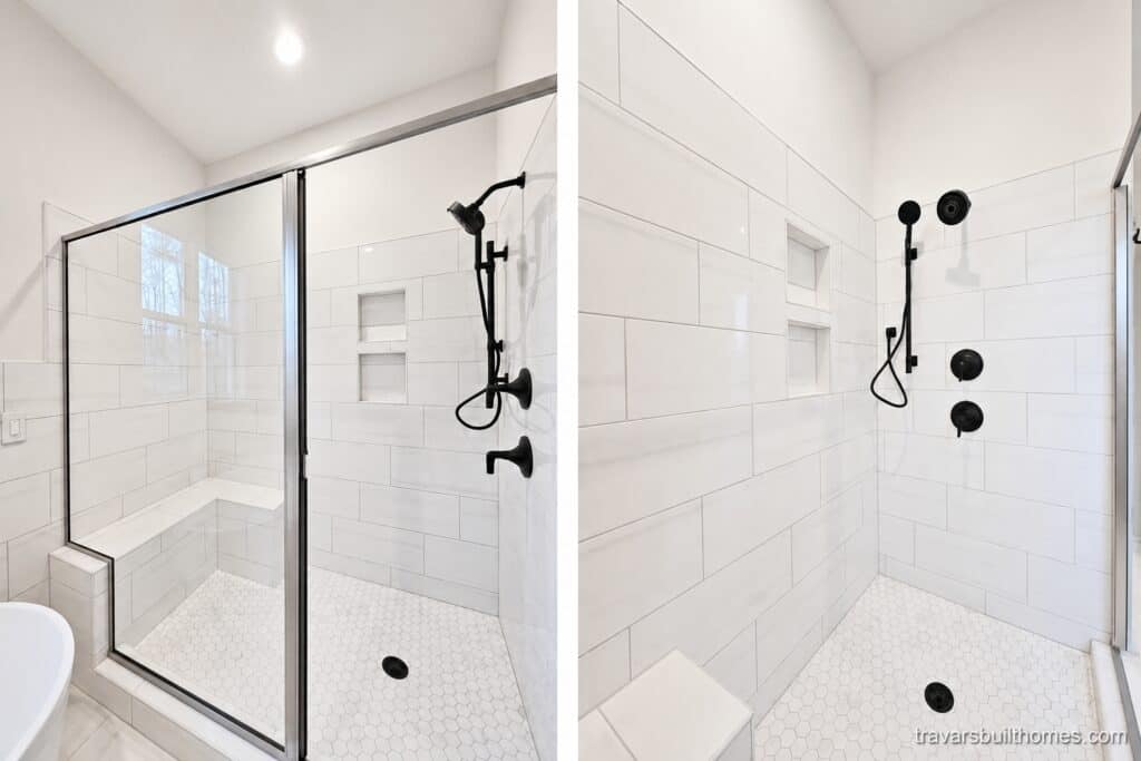 Custom luxury walk-in shower featuring a frameless glass enclosure, white horizontal wall tile, built-in niches, a bench seat, and matte black fixtures, built by Travars Built Homes.